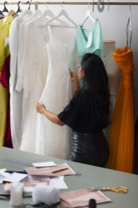 medium shot brazilian woman working as clothing designer